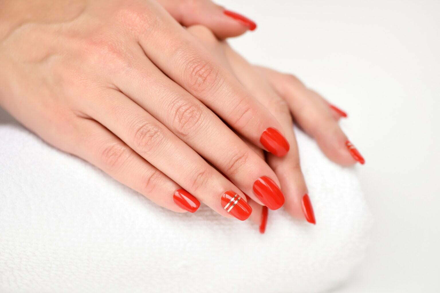 Unique Nail Concepts at XO Nail Salon Sunny Isles. red nail polis