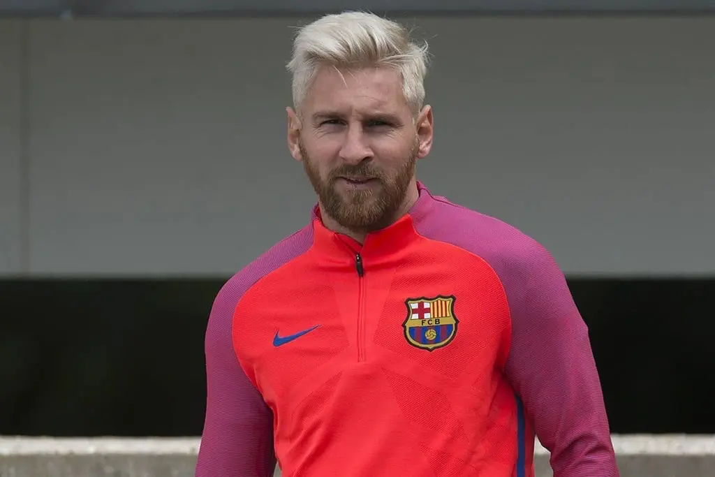 Lionel Messi shows off shocking new haircut as he cuts holiday short to  head to England | The Sun