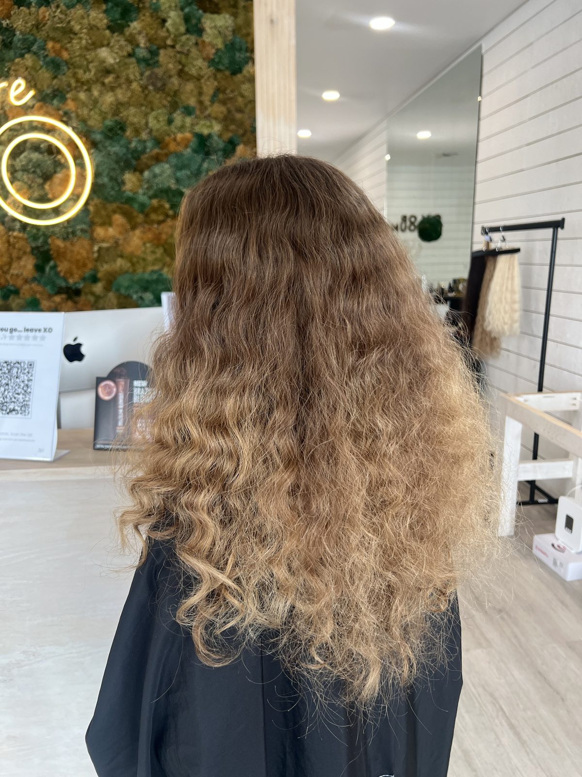 Before balayage: brassy, grown-out curly hair