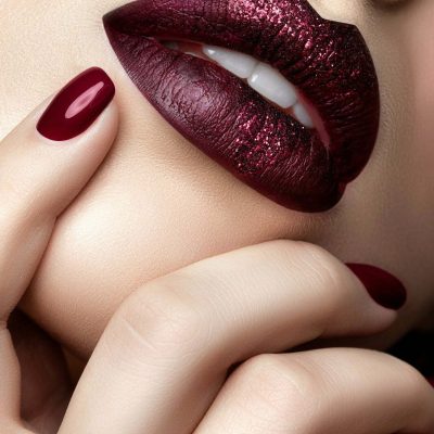 Unique Nail Concepts Salon Sunny Isles. Close up view of beautiful woman lips